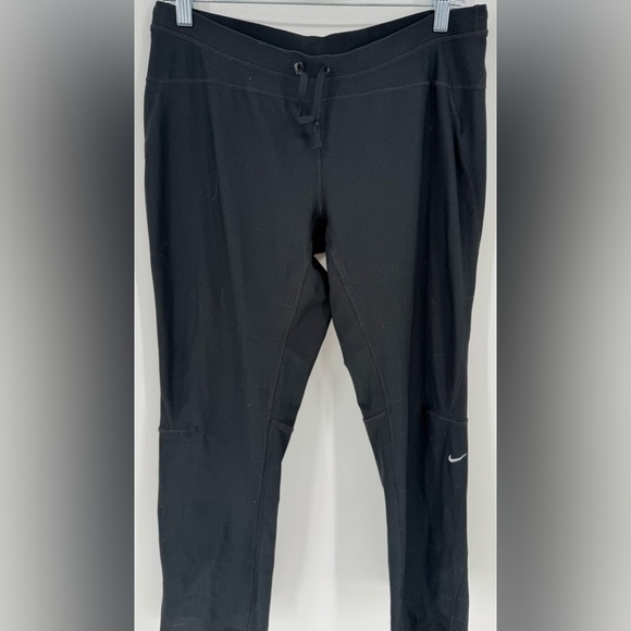 Nike Women's Dri-FIT Unlimited Zippered Cuff Versatile Pants - Picture 2 of 16
